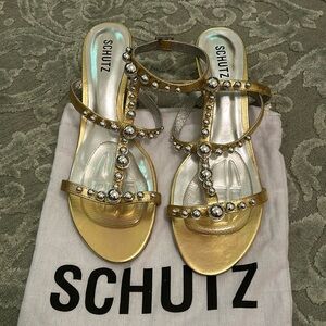 Schultz brand new gold leather with silver balls, size 11.